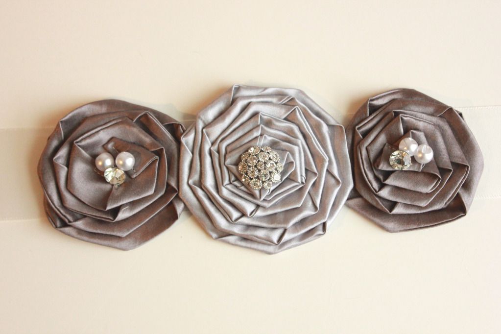Folded rosette flower with embellishment ideas.